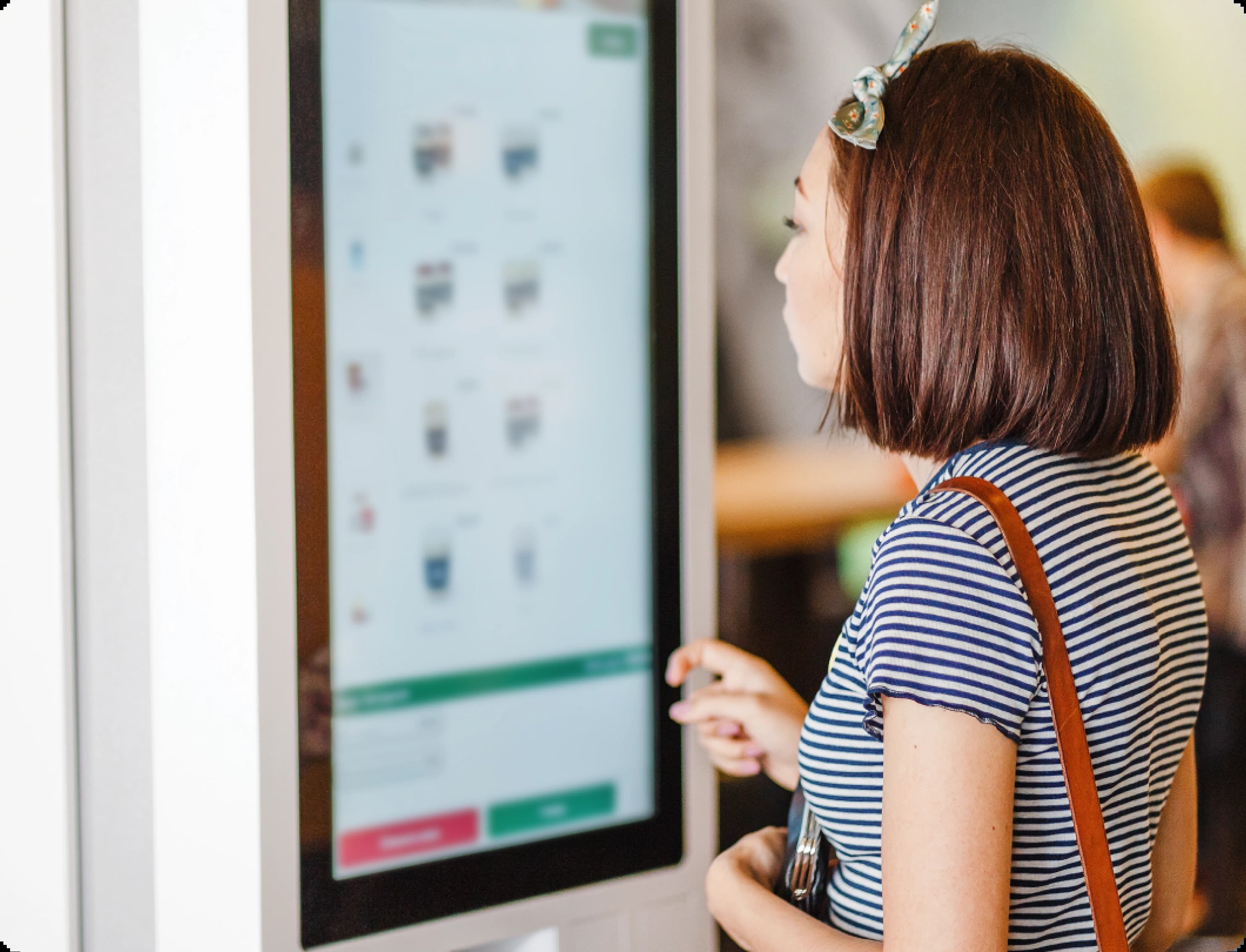 Customer using kiosk